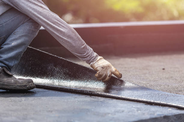Professional Basement Waterproofing technician working in Newberg, OR